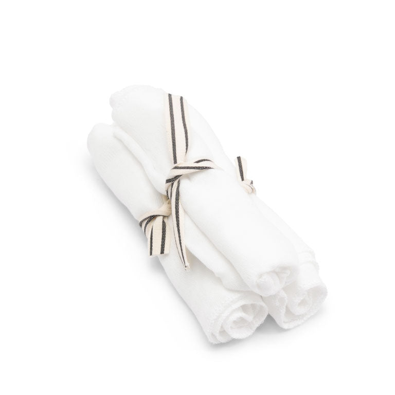three facial shammys tied up on a white background